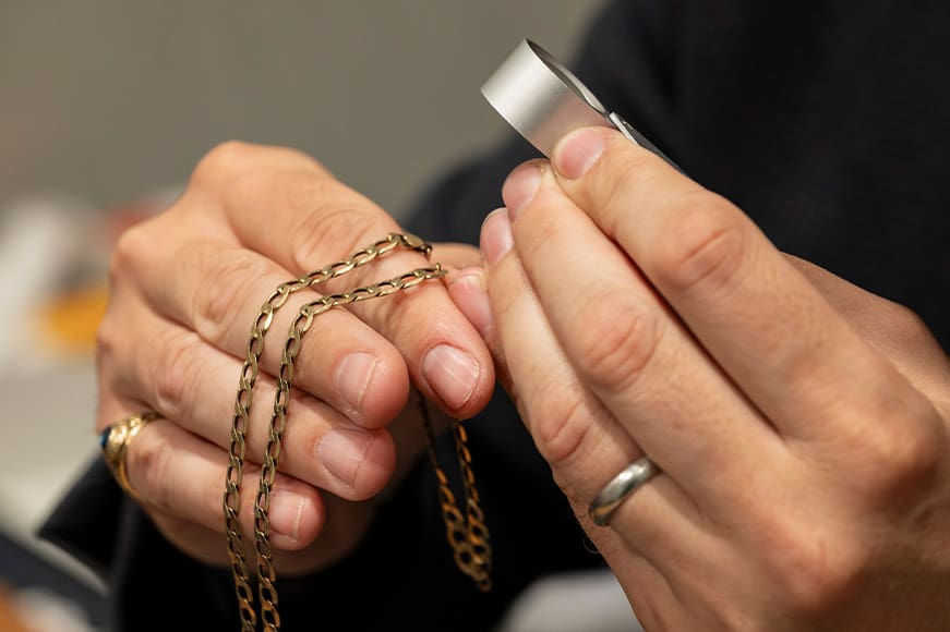 Inspecting a Gold Chain
